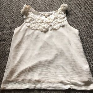 White sleeve less blouse